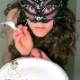 A plump, masked girl takes a huge shit on a plate and pisses into a cup. She dissects her shit with a fork before feeding it to you. Presented in 720P HD. About 4 minutes.